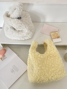 Chic fuzzy lamb wool tote bag in cream white and soft yellow for daily commute