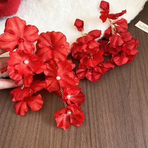 Exquisite bridal red fabric flower drop earrings with pearls and gold tassel fringe
