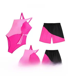 Family set of matching neon pink and black swimwear with stylish ring detail