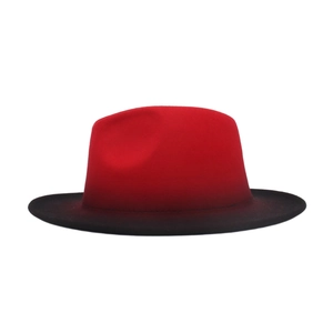 Detail of red and black gradient wool felt fedora with classic indented crown top