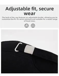 Detail of adjustable silver metal buckle on black winter wool flat cap for men