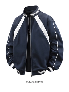 Detailed view of heavy knit sports jacket featuring white stripe panels and ribbed collar