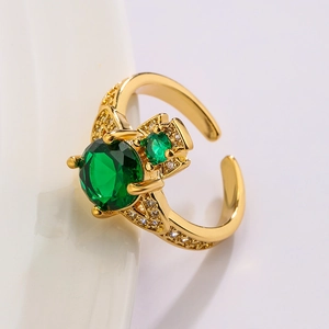 Irregular geometric gold-plated ring with round emerald gemstone and pave diamonds