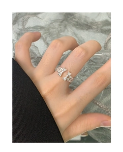 Detail of S925 sterling silver ring featuring a double bow-knot hollow design