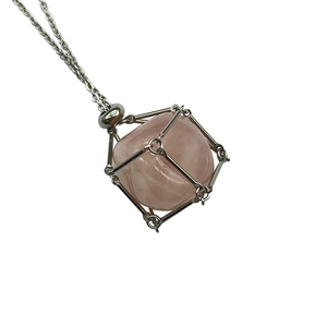 Natural pink crystal pendant in silver mesh cage with bamboo style stainless steel chain