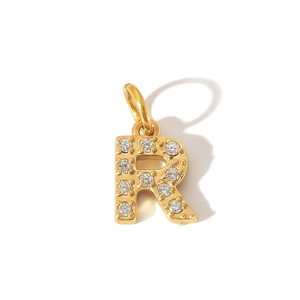 Detail view of a 316L gold-plated stainless steel letter R pendant with zircon inlay