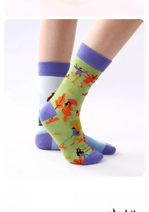 Detail of crew socks with colorful illustration and high-elastic ribbed cuff