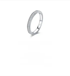 Macro detail of S925 sterling silver stamp and baguette-cut stones in channel setting