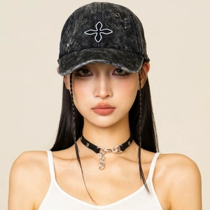 Distressed black denim baseball cap featuring white cross embroidery and vintage texture