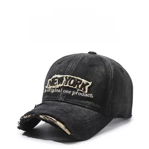 Close-up detail of vintage distressed denim baseball cap with New York embroidery