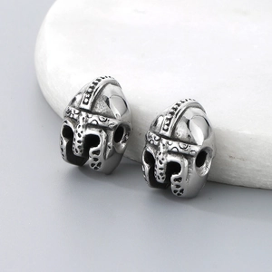 Detailed macro view of silver medieval helmet beads with 2.2mm hole for jewelry making