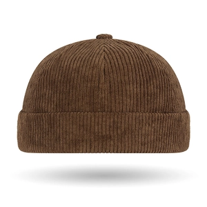 Retro dark brown corduroy docker cap with ribbed texture and classic rolled edge detail