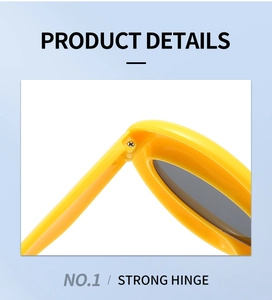 Detail view of the durable screw-fixed hinge on yellow plastic cat-eye sunglasses