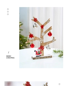 Detailed view of a wooden Christmas tree table ornament with red ornaments and Santa decor