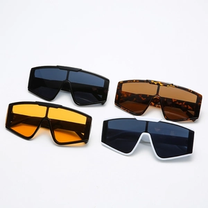 Modern oversized wrap-around sports sunglasses in multiple colors on white background