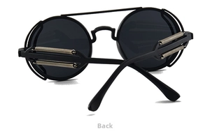Detail of steampunk round sunglasses featuring unique spring temples and matte black frame