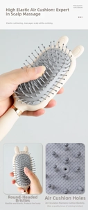 Detail of high-elasticity air cushion and round-tip massage needles on beige rabbit hairbrush