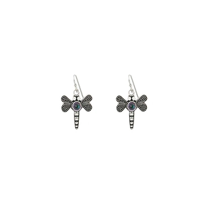 Close-up of vintage silver dragonfly earrings with purple center gemstone details