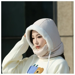 Side view of woman wearing windproof winter hood with plush lining and integrated mask.