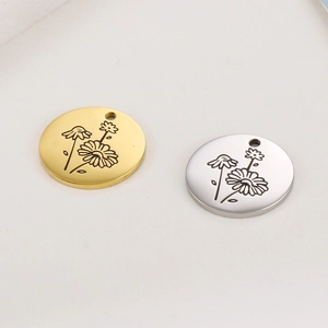 Minimalist gold and silver stainless steel round pendants with engraved daisy flower motifs