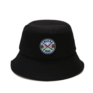 Black cotton bucket hat with Wild and Free mountain embroidery on a clean white background