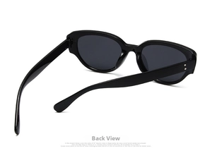 Detail showing back view of black cat-eye sunglasses with silver rivet decorations