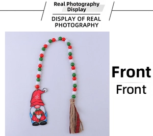 Detail view of colorful wooden beads with gnome charm and rustic jute tassel ornament