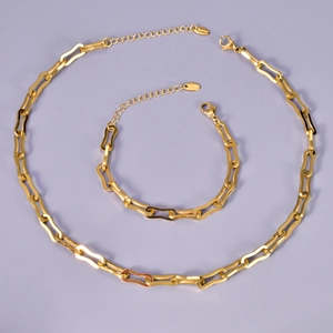 Detail view of 18K gold plated stainless steel necklace and bracelet with adjustable chains
