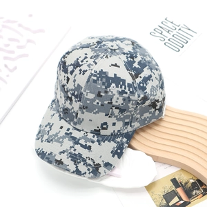 Detailed close-up of blue digital camouflage baseball cap showing canvas texture and vents