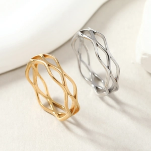 Modern hollow cross lattice titanium steel rings in polished gold and silver finishes