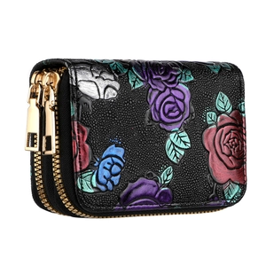 Portefeuille en cuir noir à double fermeture éclair avec motifs floraux en relief