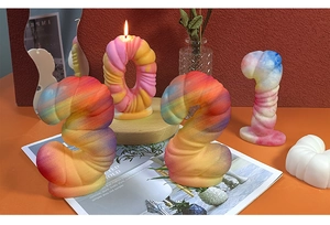 Detail showing 3D number shaped colorful gradient scented candles with smooth texture