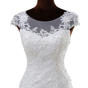Elegant white lace wedding dress with backless design and sequin floral embroidery