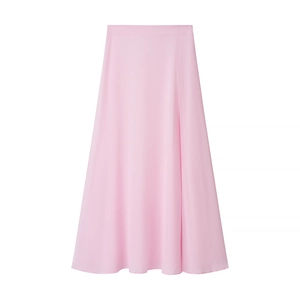 Detail of light pink long skirt featuring smooth silky fabric and elastic waist