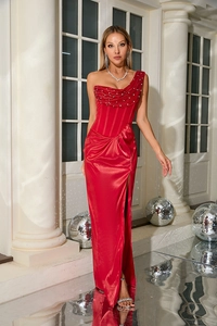 Close-up of red one-shoulder satin dress with pearl neckline and side slit detail
