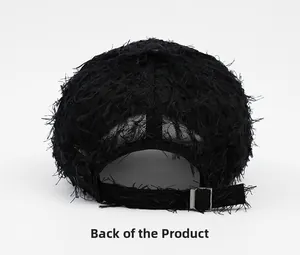 Rear view of black distressed cotton baseball cap with adjustable metal buckle and fringe
