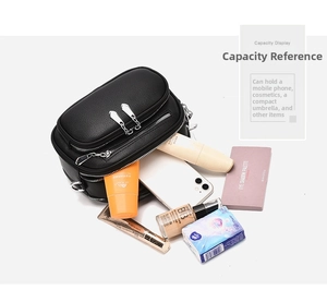 Capacity display of black leather crossbody bag showing phone and cosmetics storage
