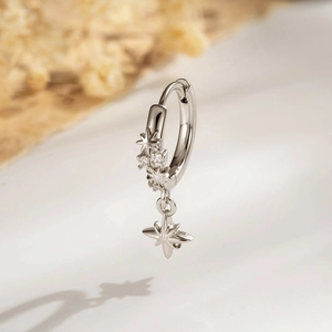 Silver star hoop earring with cubic zirconia pendants and sparkling star-shaped charms