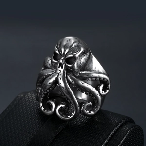 Macro detail of vintage punk octopus skull ring with oxidized silver finish textures