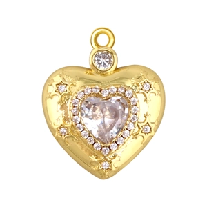 Detailed close-up of a heart-shaped gold-plated pendant with sparkling zircon inlay