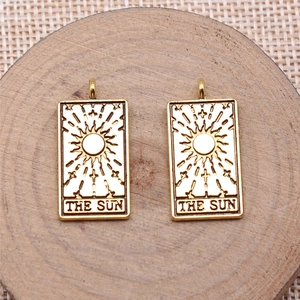 Golden Sun Tarot card pendants featuring a rectangular vintage metal design in a 2-piece set