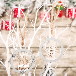 3D wooden reindeer Christmas ornaments hanging on branches with rustic festive decor