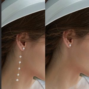 Dual-style wearing detail of elegant gold tassel earrings with hanging white pearls