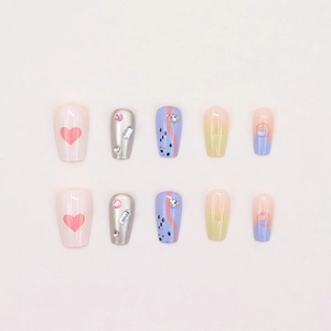 Detail of 10pcs medium-long press-on nails with colorful hearts and rhinestone accents