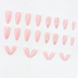 Almond press-on nails with soft pink glossy finish and white daisy hand-painted flower art