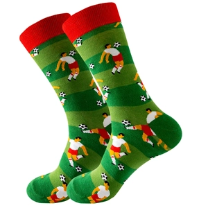 Detail of creative soccer socks featuring dynamic player patterns and green knit texture