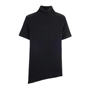 Detail of high neck short sleeve top with asymmetrical hem in black knit fabric