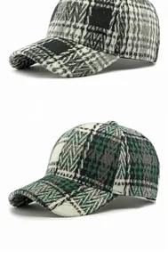 Detailed view of heavy tweed texture and retro plaid patterns on structured baseball caps
