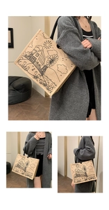 Detail of beige linen tote bag with black artistic pastoral line drawing and black handles