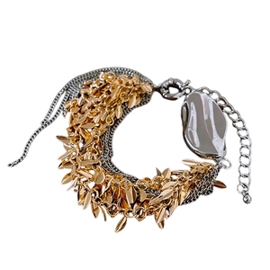 Multilayer leaf tassel bracelet with silver irregular polished metal block and gold charms